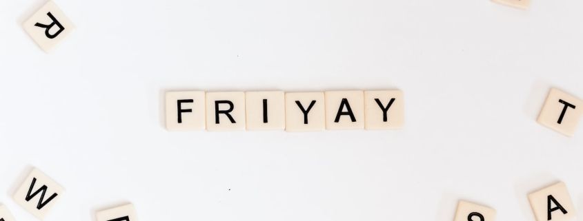 Friyay scrabble pieces on white surface