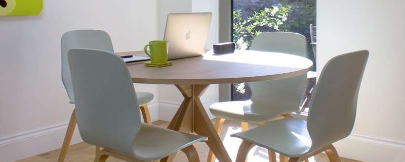 white and brown wooden table with chairs