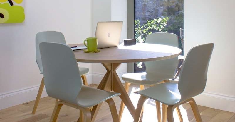 white and brown wooden table with chairs