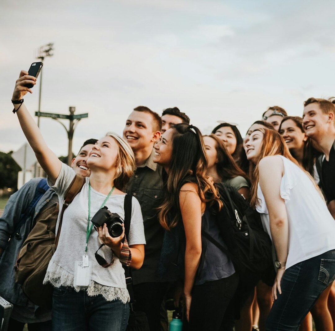 a group of people taking a picture together